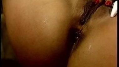 Cute young woman is turned on by cleaning out her asshole with liquid