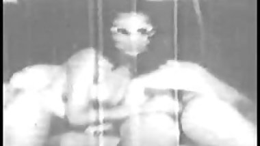 A hot brunette slut in sunglasses sucks a guy off and gets banged from the back