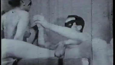 Vintage hottie fucked on bed by masked guitar hero with big cock