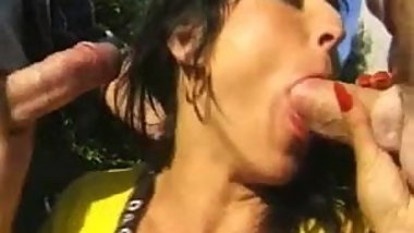 Double penetration MILF outdoors.