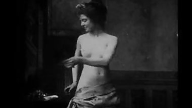 Vintage Erotic Movie 6 -  Seminude Woman combing Hairs 1905
