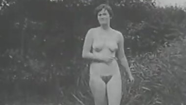 Nude by the lake