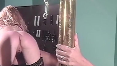 Stockings clad blonde whipped while teasing bound sub