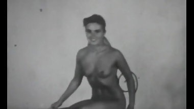 Cute brunette showing her attributes (Vintage c. 1950s-60s)