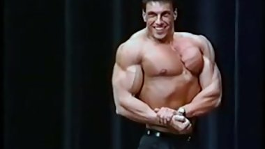 Vintage Bodybuilder Posing on Stage
