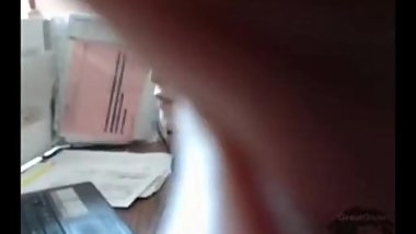 at work with a dildo up her ass