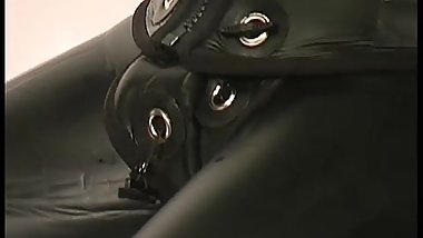 Dressing in beavertail wetsuit & knee boots, wearing black latex catsuit