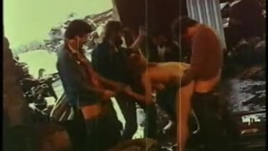 Lisa Deleeuw Pulls a Train in a Junkyard - Vintage