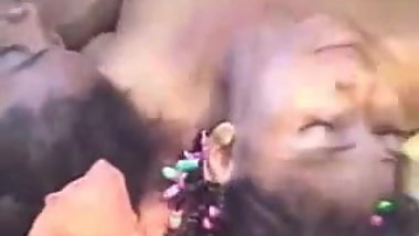 A lucky man on the beach with two ebony nymphs