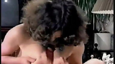 Busty Vintage Titfucker 01